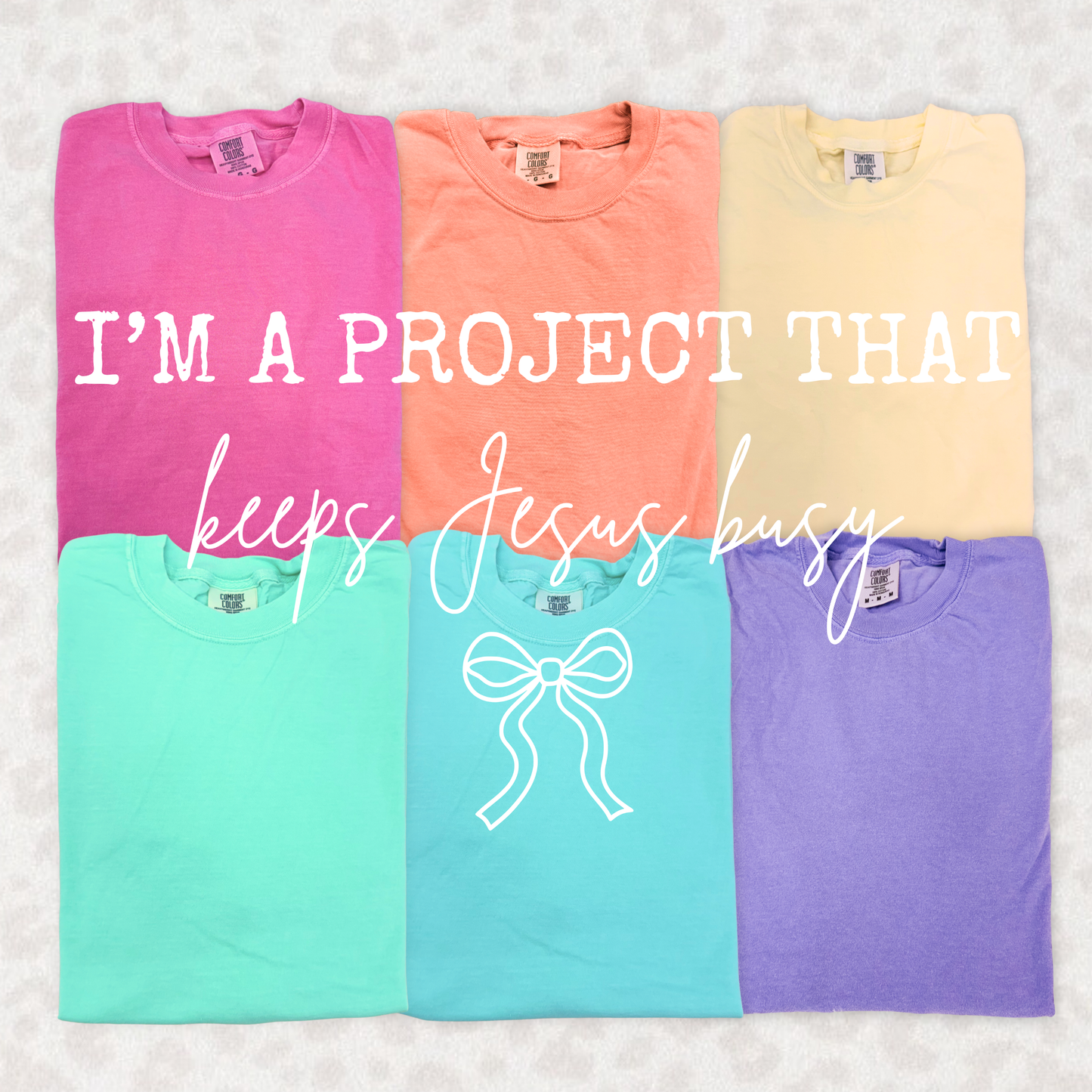 I’m A Project That Keeps Jesus Busy Graphic Tee | Funny Faith Shirt | Christian Humor Tee | Boutique T-Shirt
