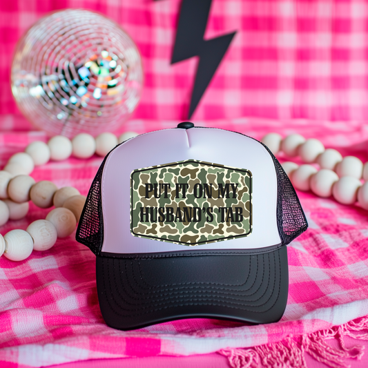 Put It On My Husband's Tab Trucker Style Hat